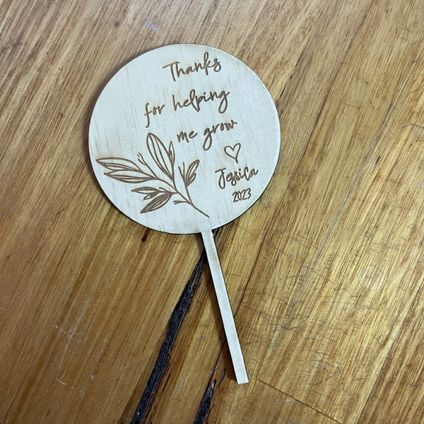 Personalised engraved wooden cake topper with custom message, handmade celebration decoration by Mudpuddles Australia