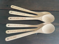 Personalised engraved wooden spoons by Mudpuddles featuring humorous custom text, handmade personalised gift Australia