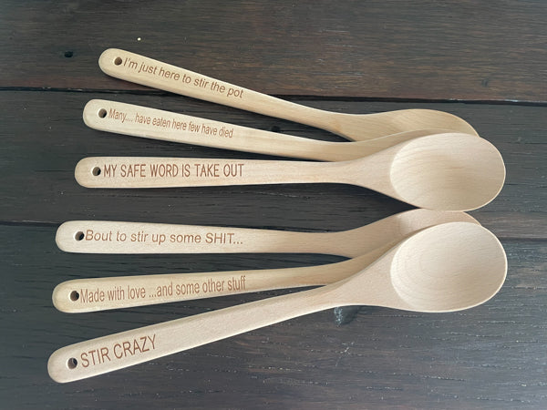 Personalised engraved wooden spoons by Mudpuddles featuring humorous custom text, handmade personalised gift Australia
